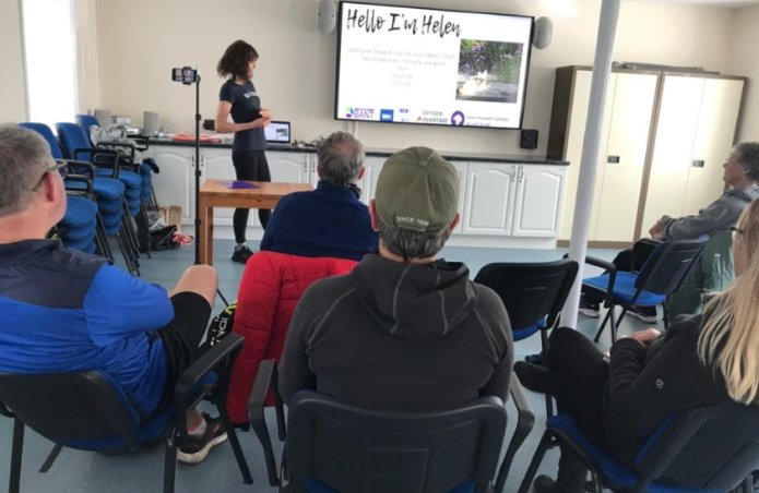 helen-is-giving-a-presentation Helen is giving a presentation